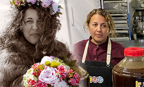 A woman poses with a bouquet of flowers